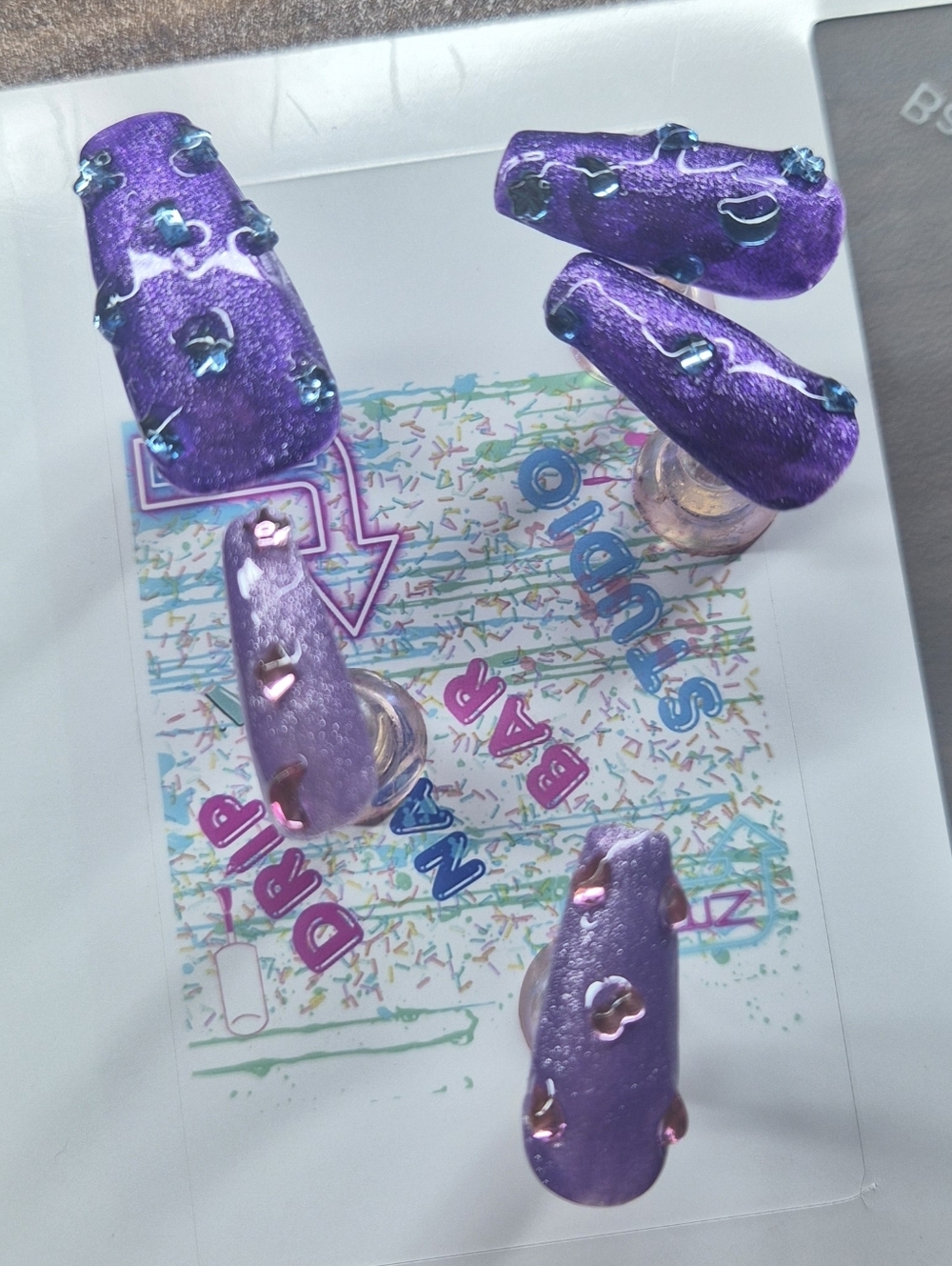 Handcrafted Purple Press-On Nails with Teal Gem Accents
